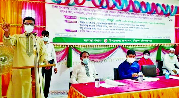 State Minister for Shipping Khalid Mahmud Chowdhury speaks at the inaugural ceremony Kanchan New Model Degree College Academic Building in Biral and distribution of government financial aid among the individuals and various organisations in Biral Upazila