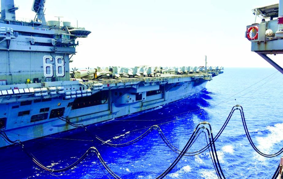 The US Navy aircraft carrier USS Nimitz receives fuel from the Henry J Kaiser-class fleet replenishment oiler USNS Tippecanoe during an underway replenishment in the South China Sea on July 7 in this file photo Reuters.
