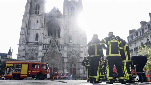 Firefighters at work to put out a fire at the cathedral in Nantes, western France. Internet