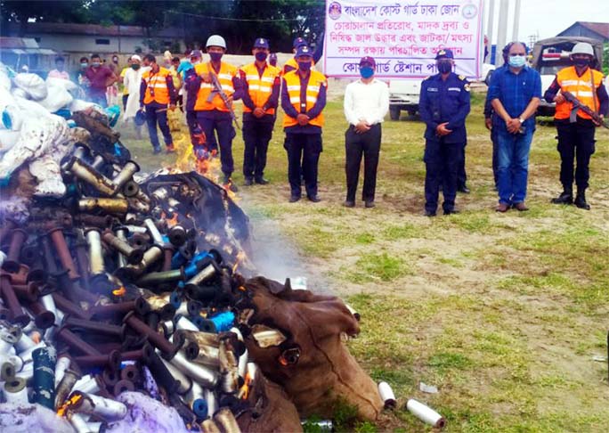 Bangladesh Coast Guard members along with police in a joint drive seized a huge quantity of illegal goods including fishing nets and drugs raiding different areas in Munshiganj disterict. Later the seized goods were burnt to ashes in presence of officials