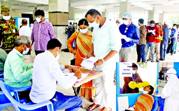 Bangladeshi citizens intending to travel abroad form a long queue to give their samples for Covid-19 tests at the temporary coronavirus isolation centre at Mohakhali's DNCC Market on Monday. In the Inset: A health worker collects swab from an outbound fe
