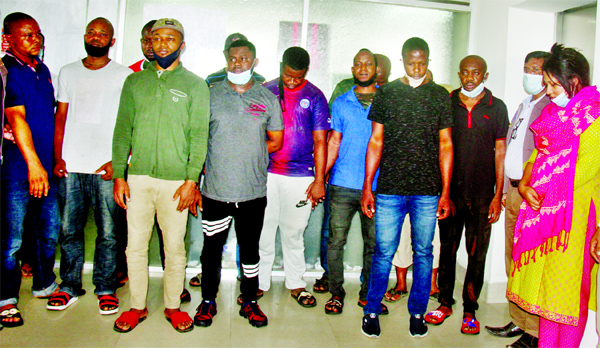 The Criminal Investigation Department (CID) on Wednesday detains 12 foreign nationals along with a female Customs official for their alleged involvement in fraudulent activities using social media platform Facebook.