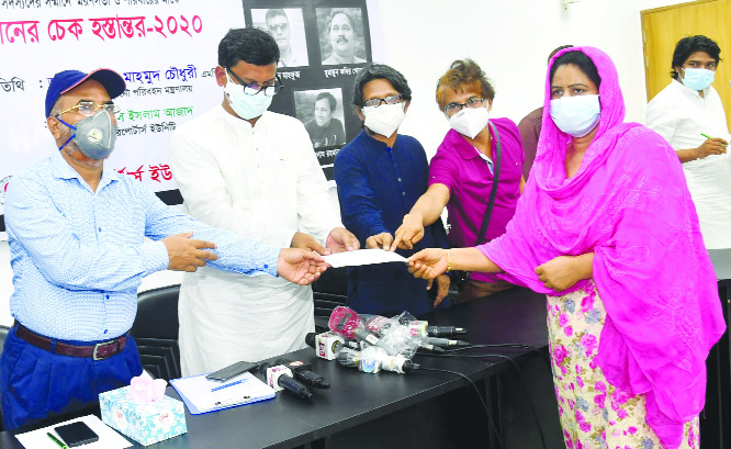 State Minister for Shipping Khalid Mahmud Chowdhury hands over cheques of financial assistance among the family members of deceased DRU members in DRU auditorium on Friday.