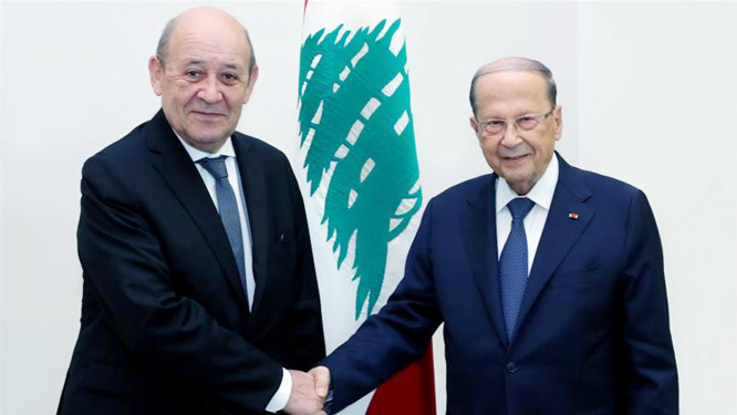 Lebanese President Michel Aoun receives France's Foreign Minister Jean-Yves Le Drian at the Baabda Palace in Beirut