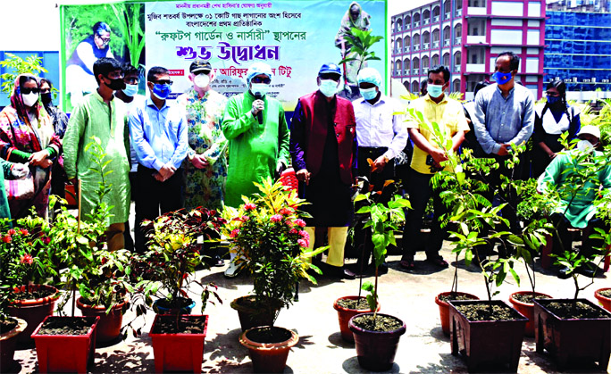 President of the Managing Committee of the city's Willes Little Flower School and College Arifur Rahman Titu inaugurates the roof top garden as part of the tree plantation programme marking 'Mujib Barsho'. The snap was taken from the roof of the instit