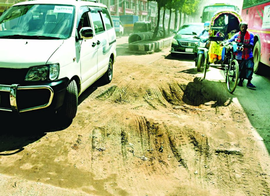Numerous potholes and large-size of cracks have been developed on the road stretching from Motijheel Colony Bazar to Kamalapur making it almost impossible for the commuters to smoothly move, especially during rainy season. This snap was taken from in fr