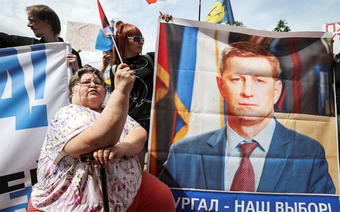 People take part in a rally in support of arrested regional governor Sergei Furgal who is accused of organising the murder of several entrepreneurs 15 years ago, in Khabarovsk, on Saturday.