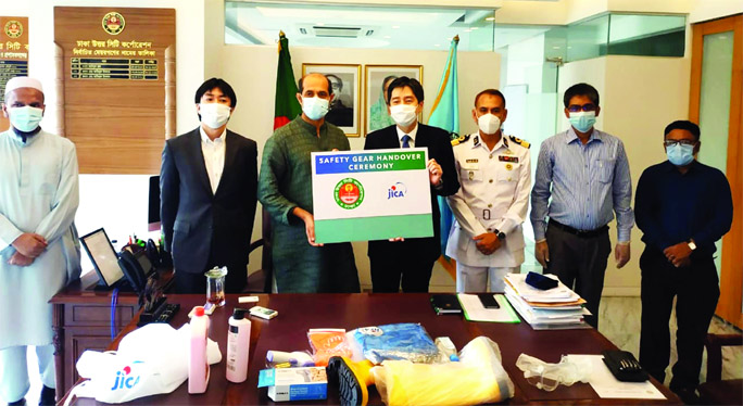 Chief Representative of JICA in Bangladesh Hayakawayuho hands over Personal Protective Equipment to DNCC Mayor Atiqul Islam for the Conservancies of the corporation at DNCC Bhaban on Tuesday.