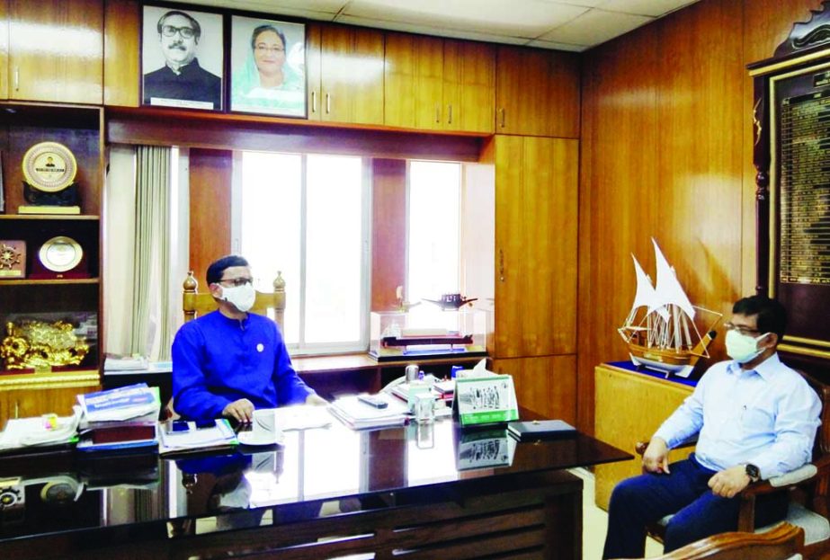 State Minister for Shipping Khalid Mahmud Chowdhury exchanges Eid-ul-Azha greetings with the officials of the ministry at his office on Monday.