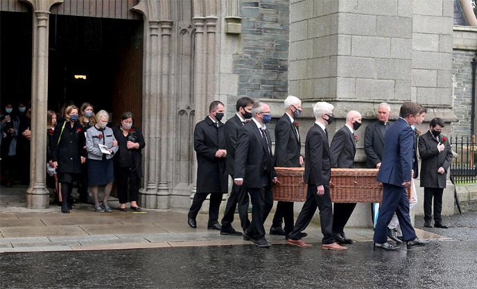John Hume's coffin is carried from St Eugene's Cathedral in Londonderry, Northern Ireland on Wednesday.