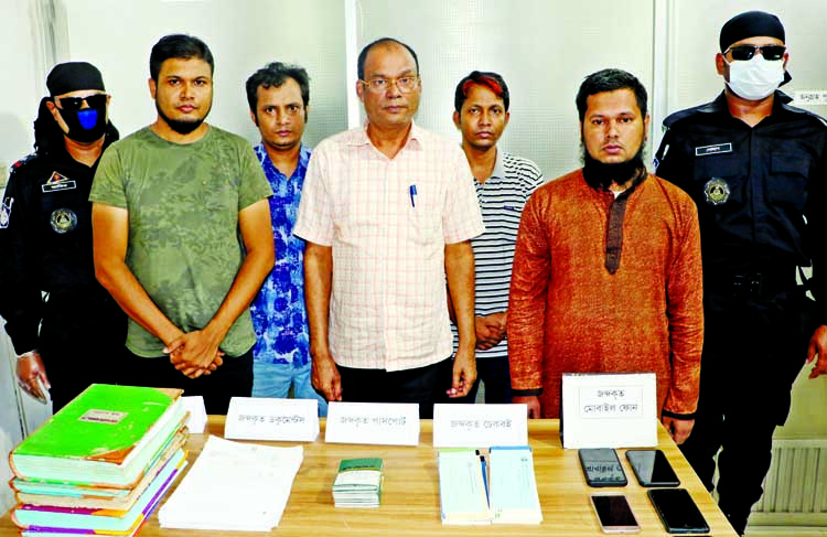 Members of RAB-3 and National Security Intelligence nab six persons with passport and other documents from the city's Hatirjheel area on Thursday for their allegedly involvement in illegal manpower export.