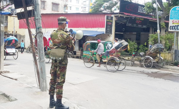 Bangladesh Army conducts mass awareness campaign with a view to resisting coronavirus. The snap was taken from the city's Hazaribag on Friday.