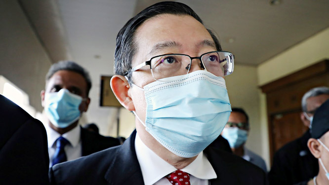 Malaysia's former Finance Minister Lim Guan Eng leaves Kuala Lumpur High Court in Kuala Lumpur on Friday.