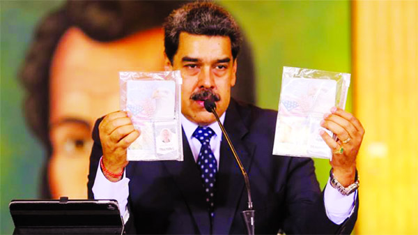 Personal documents of the Americans are shown by Venezuela's President Nicolas Maduro.