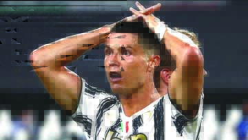 Juventus' Cristiano Ronaldo reacts during the Champions League round of 16 second leg match between Juventus and Lyon at the Allianz stadium in Turin, Italy on Friday.