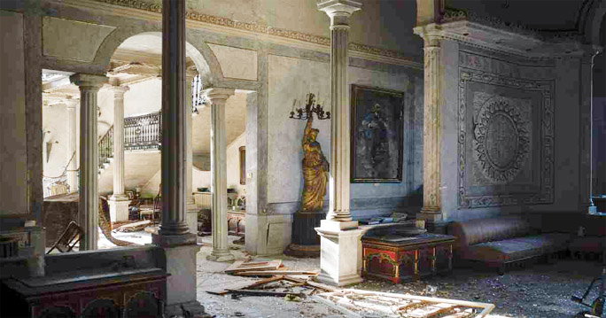 Broken glass and window frames lay on the floor of the Sursock Palace, heavily damaged after the explosion in the seaport of Beirut, Lebanon.
