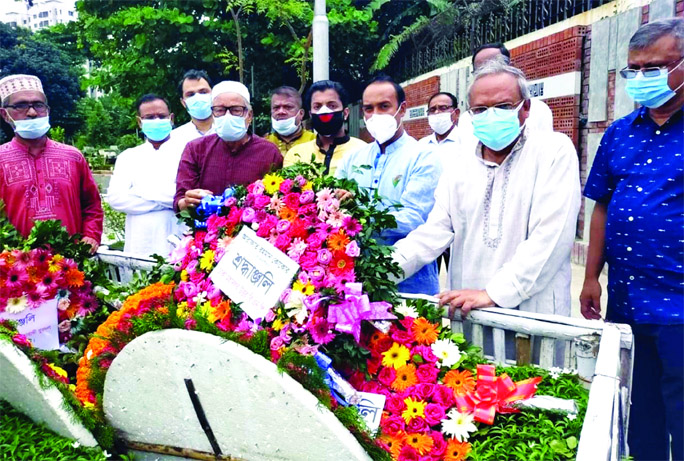 Leaders and activists of BNP place floral wreaths on the grave of late Arafat Rahman Koko at Banani Graveyard in the city on Wednesday marking his 51st birth anniversary.