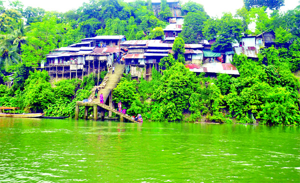 Disobeying warning of district administration, over 100 families are still living on the hilltops risking their lives where fatal accidents may occur at any time due to possible landslides even after a short spell of heavy rain. This photo of `Dhakaiya Co