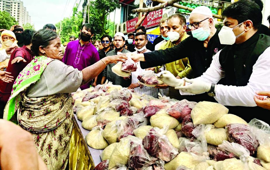 President of Dhaka South Unit of Awami League Abu Ahammed Mannafi and 26 No Ward Councillor of Dhaka South City Corporation Hasibur Rahman Manik distribute food items (1kg of meat and 1 kg of rice) among the destitute people marking the National Mourning