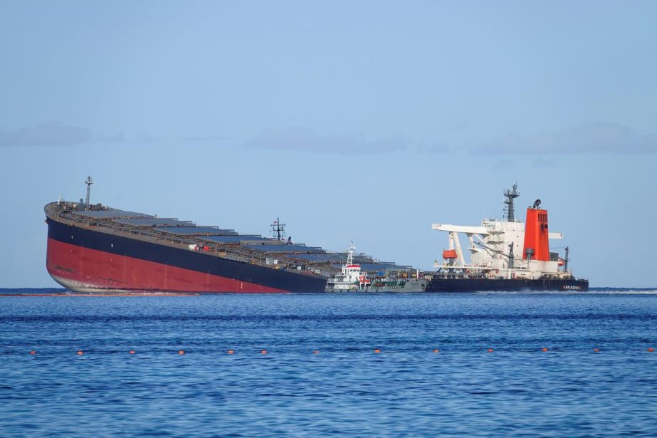 A general view shows the bulk carrier ship MV Wakashio, belonging to a Japanese company but Panamanian-flagged, that ran aground on a reef, at Riviere des Creoles, Mauritius. Agency photo