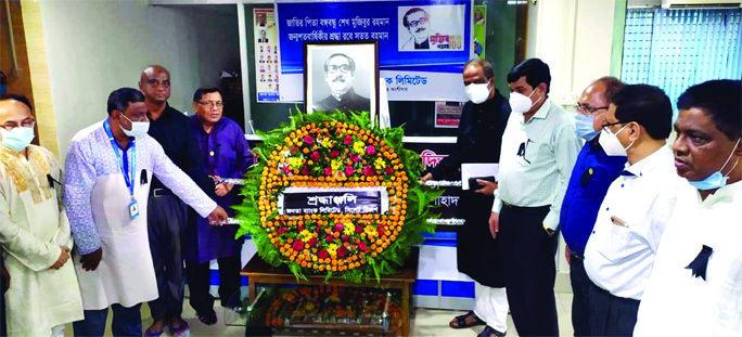 Dr. Md. Enamul Haq, General Manager of Janata Bank Ltd, Sylhet Divisional Office, places floral wreath at the portrait of the Father of the Nation Sheikh Mujibur Rahman marking the National Mourning Day 2020 on Saturday.