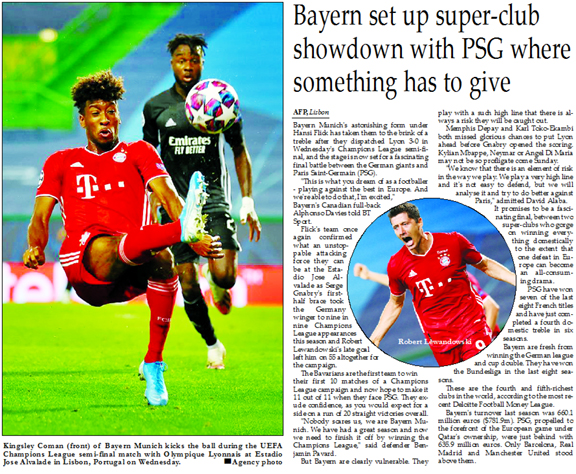 Kingsley Coman (front) of Bayern Munich kicks the ball during the UEFA Champions League semi-final match with Olympique Lyonnais at Estadio Jose Alvalade in Lisbon, Portugal on Wednesday.