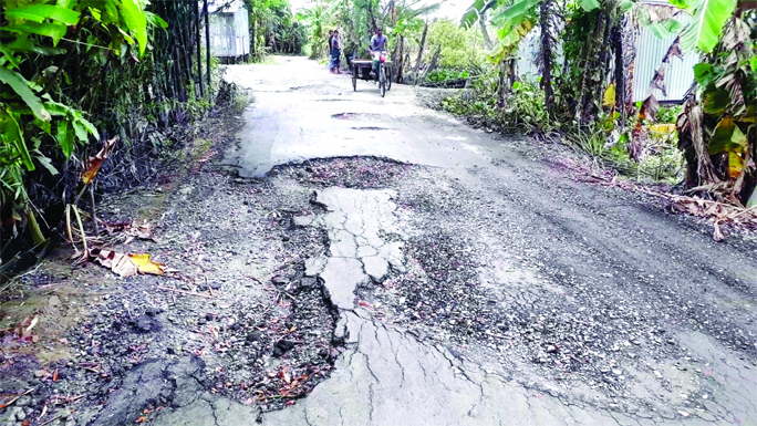 People of Shariatpur district have been suffering a lot, Dhaka-Mawa road in Sadar Upazila has become dilapidated and unfit for movement following the recent flood. This photo was taken from Janjira on Thursday.