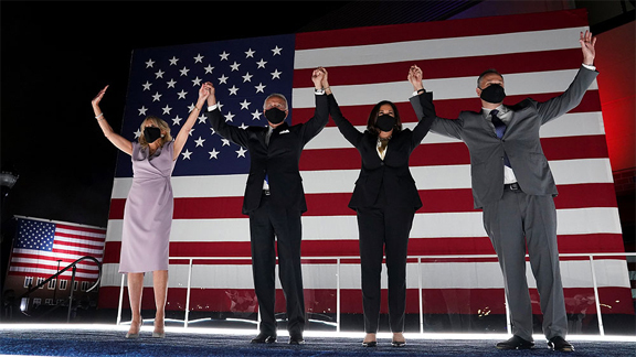 Democratic presidential candidate and former Vice President Joe Biden, his wife Jill Biden, Senator and vice presidential candidate Kamala Harris and her husband Douglas Emhoff celebrate on the final night of the 2020 Democratic National Convention at the