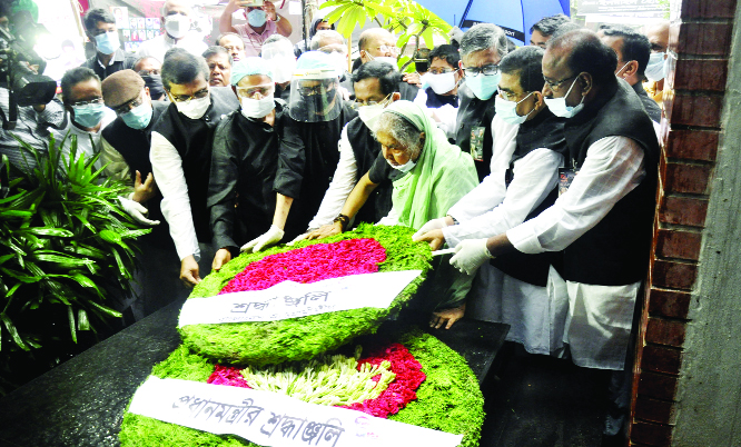 Leaders and activists of Awami League pay tributes to those who were killed in 21st August grenade attacks placing wreaths at the memorial plaque in front of AL office in the city's Bangabandhu Avenue on Friday.
