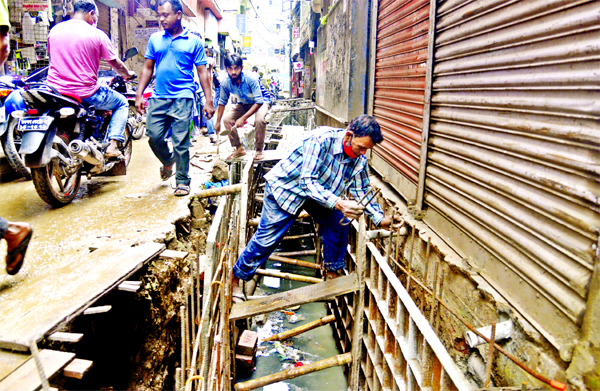 People of the city's Mokim Bazar area face severe problems for the troubled main road of this locality for constructing sewerage canal.
