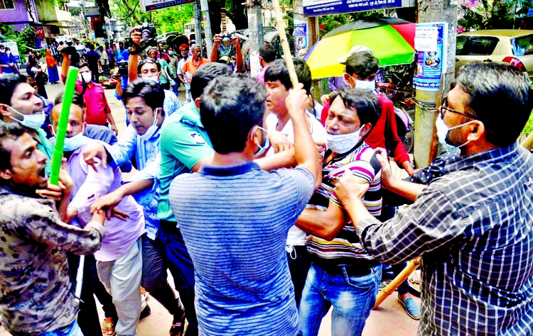 Two groups lock into clashes in front of Chattogram Press Club on Monday that left several persons injured.