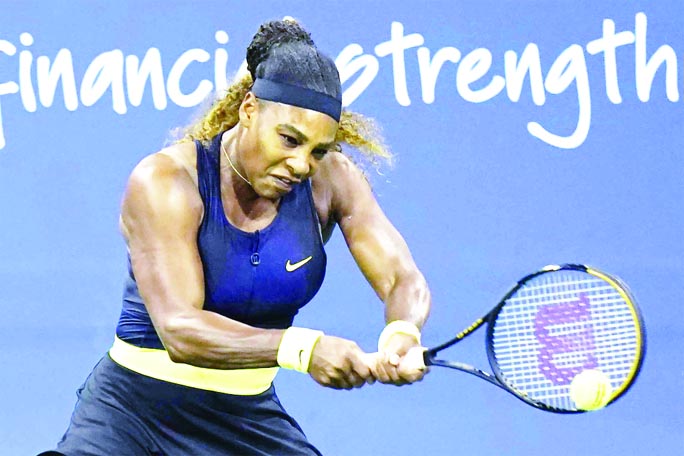 Serena Williams hits a shot to Maria Sakkari of Germany during the third round at the Western & Southern Open tennis tournament in New York on Tuesday.