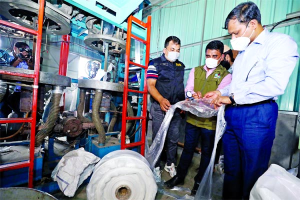 A RAB mobile court conducts drive at some factories in the city's Chawkbazar area and seals off three of them with punishing six persons for producing polythene of restricted category on Thursday.