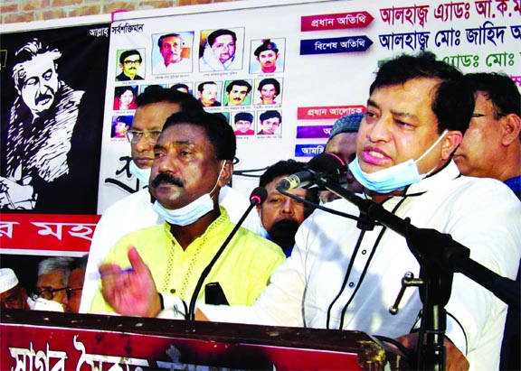 Gazipur City Corporation Mayor Md. Jahangir Alam speaks at a discussion in the city's Sagar Saikat Auditorium organised by the Gazipur City Krishak League on Thursday making the National Mourning Day.