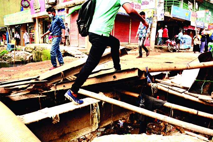 WHO CARES! Not only pedestrians but also vehicles often face difficulties following collapse of a box culvert on the city's Shanir Akhra road. More than one year has elapsed but the authorities concerned still not taken any initiative to repair the damag