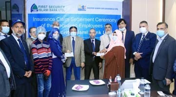 Md. Morshed Alam Siddiqui, Managing Director (CC) of Padma Islami Life Insurance Limited, handing over the cheque to the respective families of two employees of First Security Islami Bank Limited as they died under the group insurance coverage agreement a