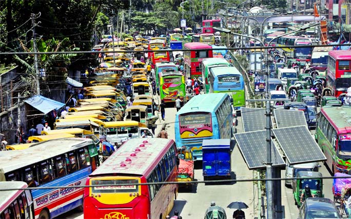 The capital city Dhaka returns to its old mood with huge traffic jam on most of the roads following haphazard parking and indisciplined movement of vehicles disobeying traffic rules. This photo was taken from Gulistan area on Thursday.