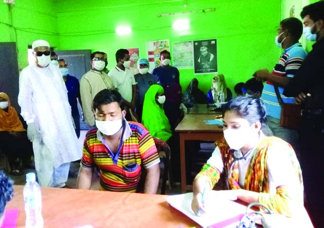 Bagerhat district's Morelganj Upazila UNO Md. Delwar Hossain visits a day-long treatment facility by the Jiban Kheya Bidyanando Floating Hospital on Friday at Boloibuniya Union. There was no fees and charges for the service. Among others, Deputy Assistan