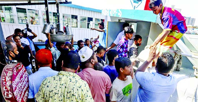 The authority concerned has introduced water bus service at Sadarghat in the capital for ferrying the people, but the passengers disregard social distancing risking transmission of the Corona. This photo was taken on Friday.