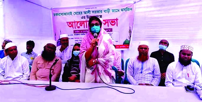 Farzana Sharmin Beauty, Panel Chairman of Mymensingh Zila Parishad, speaks at a discussion on the development of Sarkarbari Mosque at Kushmail Union in Phulbaria Upazila of Mymensingh district on Friday.