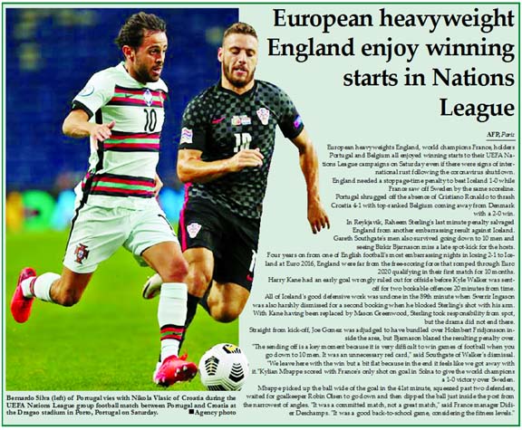 Bernardo Silva (left) of Portugal vies with Nikola Vlasic of Croatia during the UEFA Nations League group football match between Portugal and Croatia at the Dragao stadium in Porto, Portugal on Saturday.