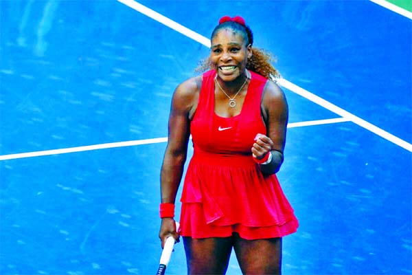 Serena Williams reacts after defeating Sloane Stephens during the third round of the US Open in New York on Saturday.