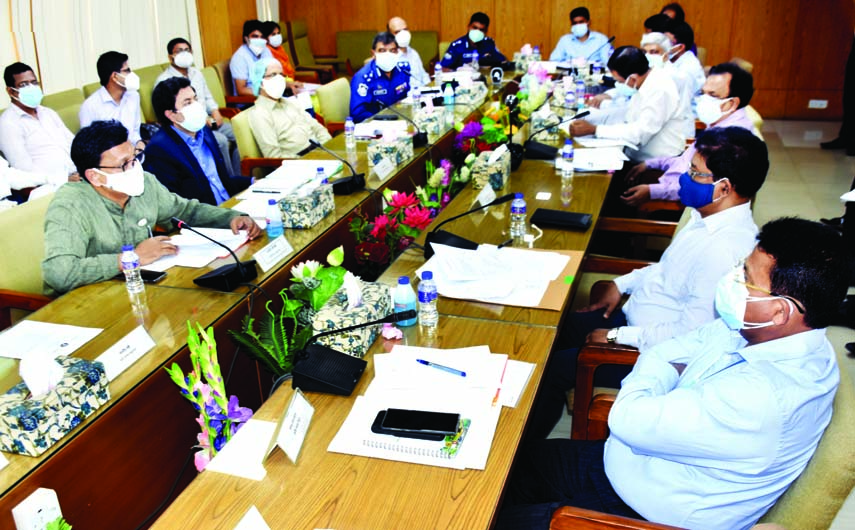 State Minister for Shipping Khalid Mahmud Chowdhury speaks at a task-force meeting at the Ministry office on Sunday. Mayor of Dhaka South City Corporation Barrister Sheikh Fazle Noor Taposh was also present there. PID photo