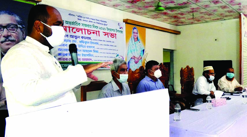 Md Rafiqul Islam, Mayor of Bhola's Borhanuddin Municipality, speaks at a discussion on Tuesday marking the International Literacy Day.