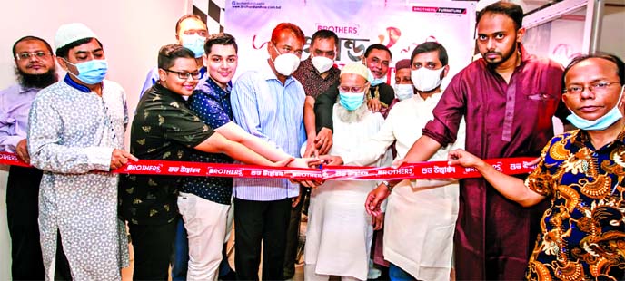 Habibur Rahman Sarkar, Chairman of Brothers Furniture Ltd, inaugurating it showroom at Rampura in the city on Wednesday. Managing Director Md. Elias Sarkar, Director Sharifuzzaman Sarkar, Head of Marketing and Sales Mohammad Monirul Islam Bakshi and Assoc