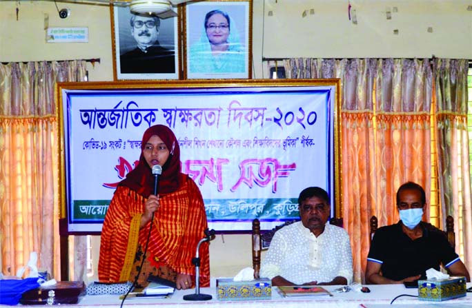 Ulipur UNO Nur-a- Jannat Rumi speaks at a discussion organized by the upazilas administration Tuesday marking the International Literacy Day. Upazila Parishad Chairman Golam Hossain Montu attended the programme as chief guest.