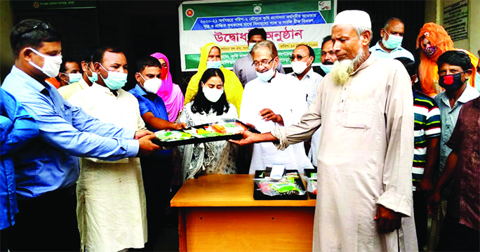 Ruhul Amin, Chairman of Rangpur's Gangachara Upazila, inaugurates the distribution work of vegetable seeds at free of cost among the farmers at the upazila parishad premises on Thursday.