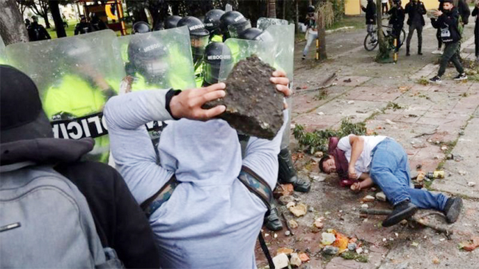 Police and protesters clashed, leaving scores injured in BogotÃ¡, Colombia on Thursday.