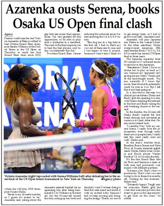 Victoria Azarenka (right) taps racket with Serena Williams (left) after defeating her in the semi-final of the US Open tennis tournament in New York on Thursday.