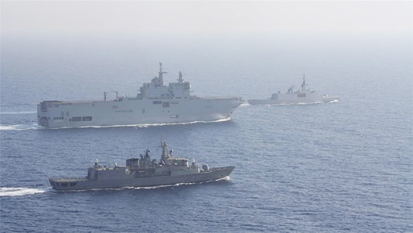 Greek and French vessels sail in formation during a joint military exercise in the Mediterranean sea, in this undated handout image obtained by Reuters.